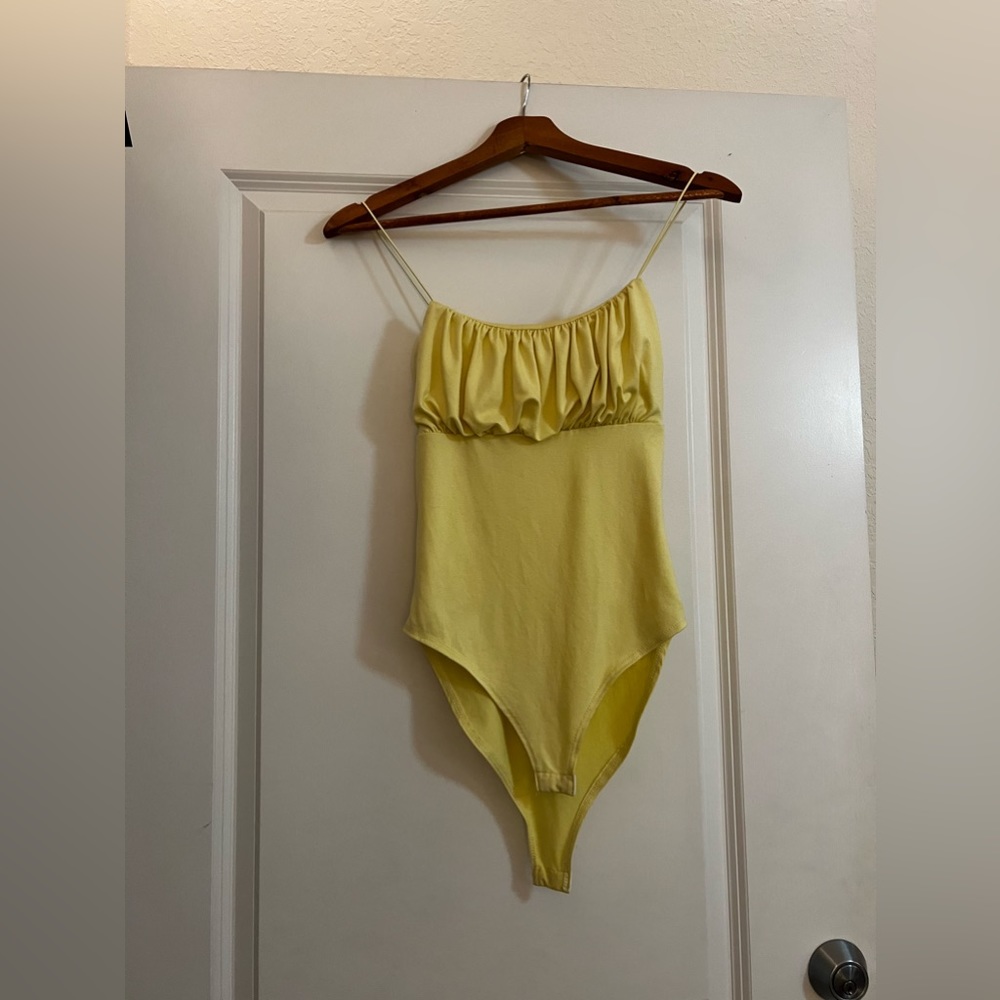 Never worn body suit!